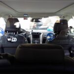 smittevegg monterat bak i en taxi i frankrike